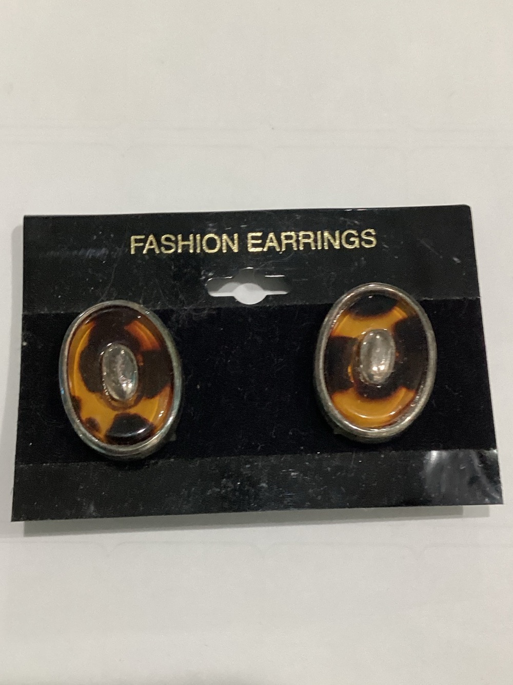 Tortoiseshell Oval Fashion clip on Earrings with Clear Center‎ Stone